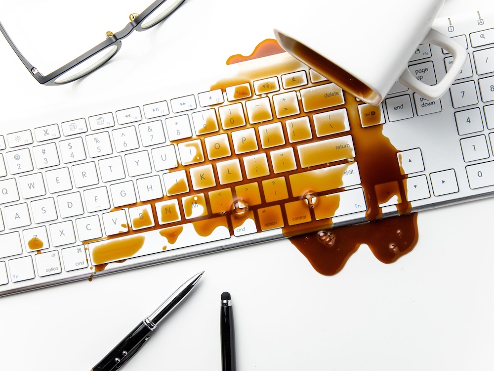 MacBook liquid damage repair after coffee spill by thinq mac